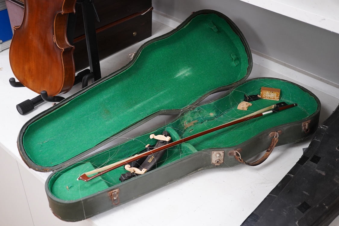 A mid 20th century cased Czech viola 15.25” body, with a fully mounted octagonal bow with plastic tip plate